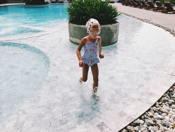 High angle view of girl in swimming pool