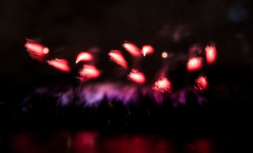 Defocused image of firework display at night
