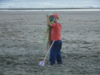 Woman standing on beach