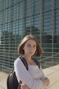 Portrait of beautiful woman in city