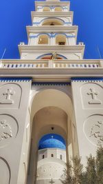 Low angle view of building against clear blue sky