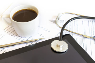 High angle view of coffee cup on table