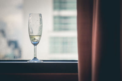 Close-up of wine glass window