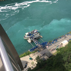 High angle view of crowd by ferry moored in niagara river