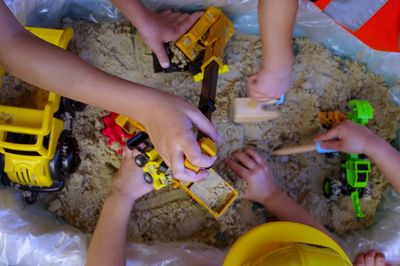 Top shot of toddlers playing in sand