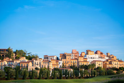 Buildings against blue sky