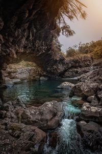 Scenic view of river amidst rocks