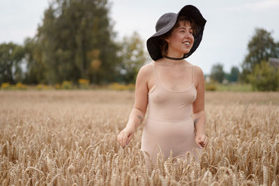 Woman standing in field