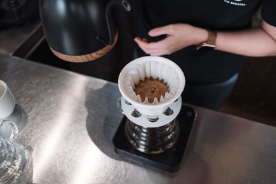 High angle view of coffee cup on table