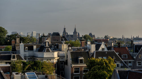 Residential district against clear sky