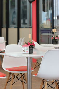 Empty chairs and table in restaurant