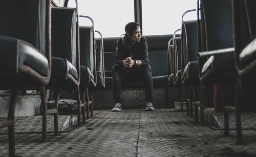 People sitting on seat in train