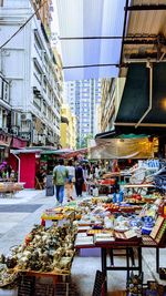 People at street market in city