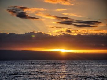 Scenic view of dramatic sky during sunset