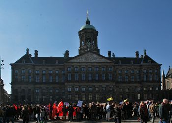 Tourists in front of historic building