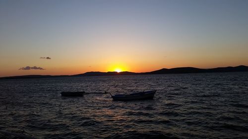 Scenic view of sunset over sea