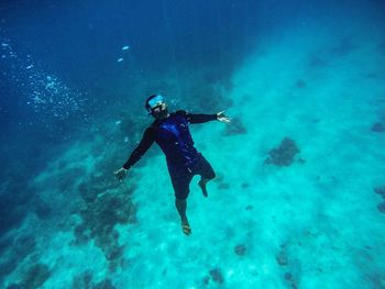 Man swimming in sea