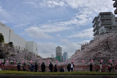 View of buildings against cloudy sky