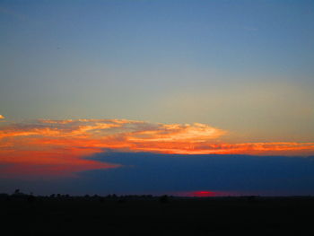 Scenic view of silhouette landscape against sky during sunset