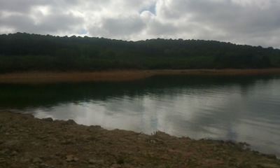 sky, water, tranquil scene, lake, tranquility, cloud - sky, scenics, cloudy, reflection, beauty in nature, nature, cloud, tree, lakeshore, non-urban scene, idyllic, landscape, river, mountain, calm