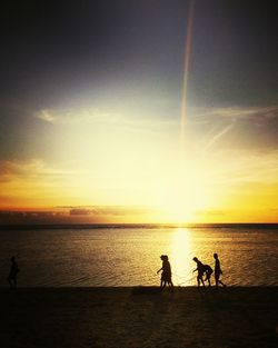 Scenic view of sea at sunset