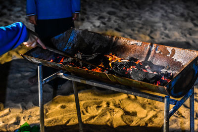 High angle view of meat on barbecue grill