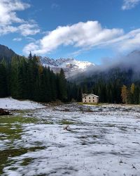 Scenic view of snow covered mountains