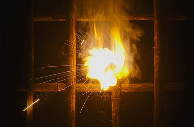 Close-up of illuminated fire at night