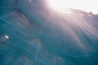 Full frame shot of sun shining over water
