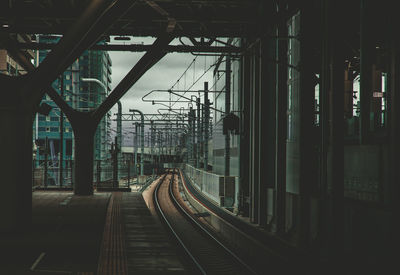 Railroad station platform seen through train