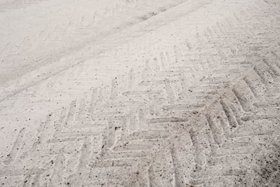 Footprints on snow at street