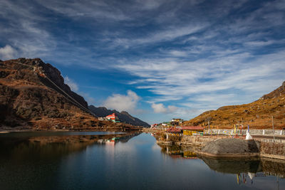 Pristine lake surrounded by himalayan mountain with pristine water reflection isolated view
