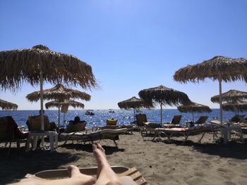 Scenic view of beach against clear sky