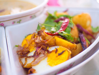 Close-up of eggs served in bowl