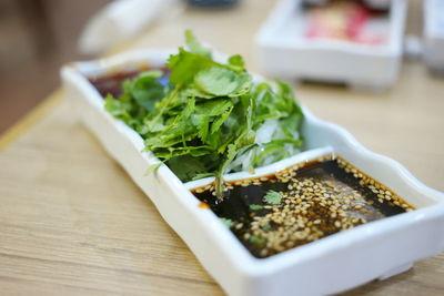 Close-up of salad in plate on table