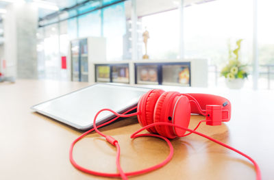 Close-up of telephone booth on table