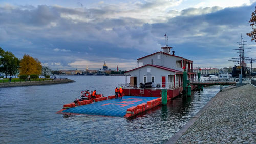 Pier over river against sky