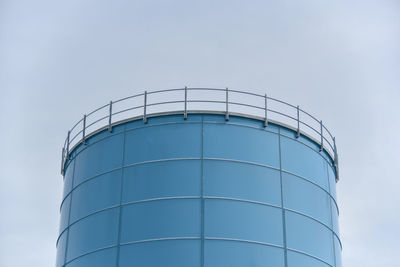 Low angle view of water tower against sky