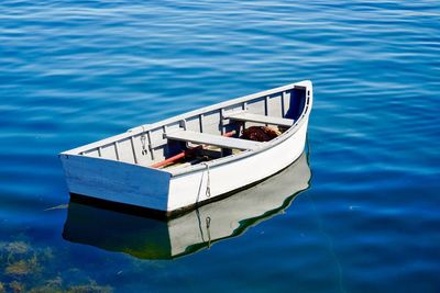 High angle view of boat moored in lake