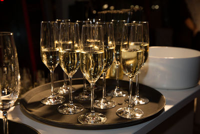 Champagne cups on serving tray