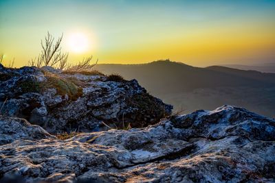 Scenic view of mountain against sky during sunset