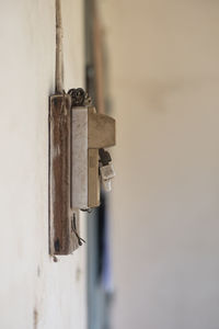 Close-up of padlock on door