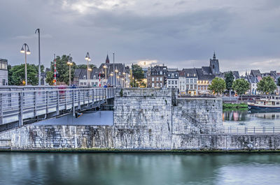 Riverfront in maastricht, the netherlands, during the blue hour