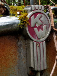 Close-up of fire hydrant against wall