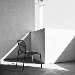 Empty chair at building terrace