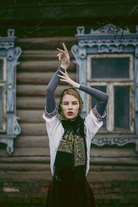 Portrait of a young woman wearing headscarf