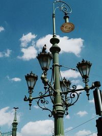 Low angle view of street light against sky