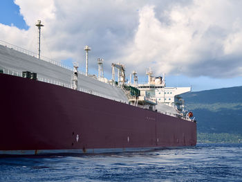 View of ship in sea against sky