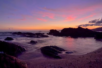 Scenic view of sea against sky during sunset