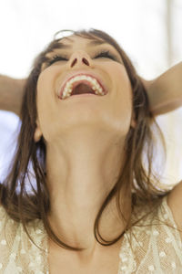 Close-up of cheerful woman